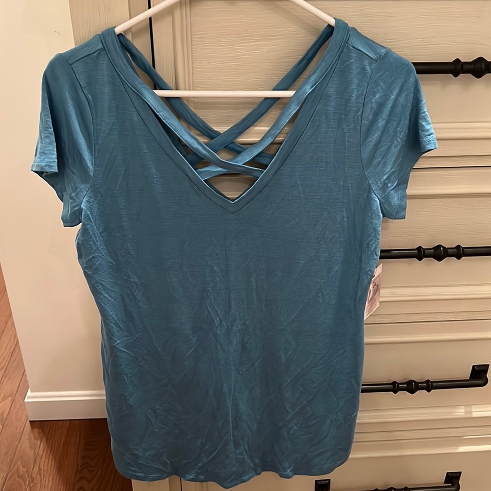 Light blue maternity top. Size M. Criss cross front and back! Never worn.